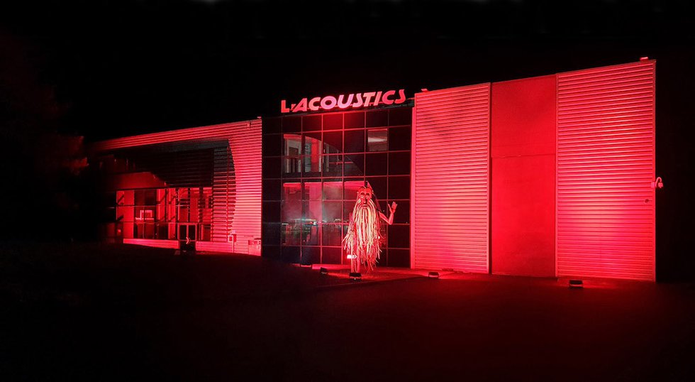 Bob in front of the head office of L-Acoustics and L-Acoustics Group with red light for #We Make Events and #Red Alert Restart, Marcoussis, France